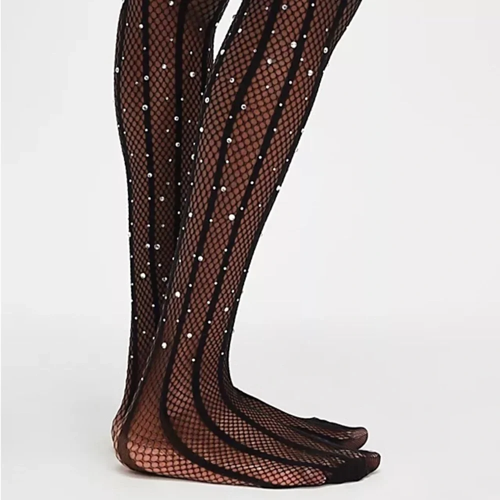 Free people X high heel jungle strobe glitter fishnet tights one size new in